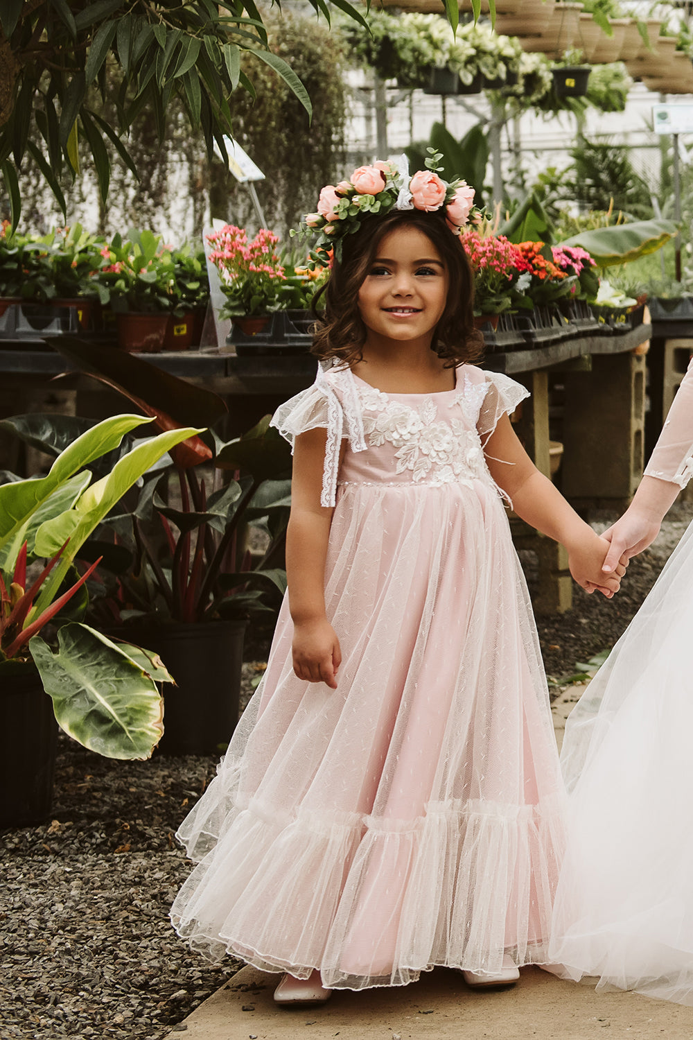 Pretty girl wearing Angel Kisses Flower Girl Dress-by Miele Moda Boutique