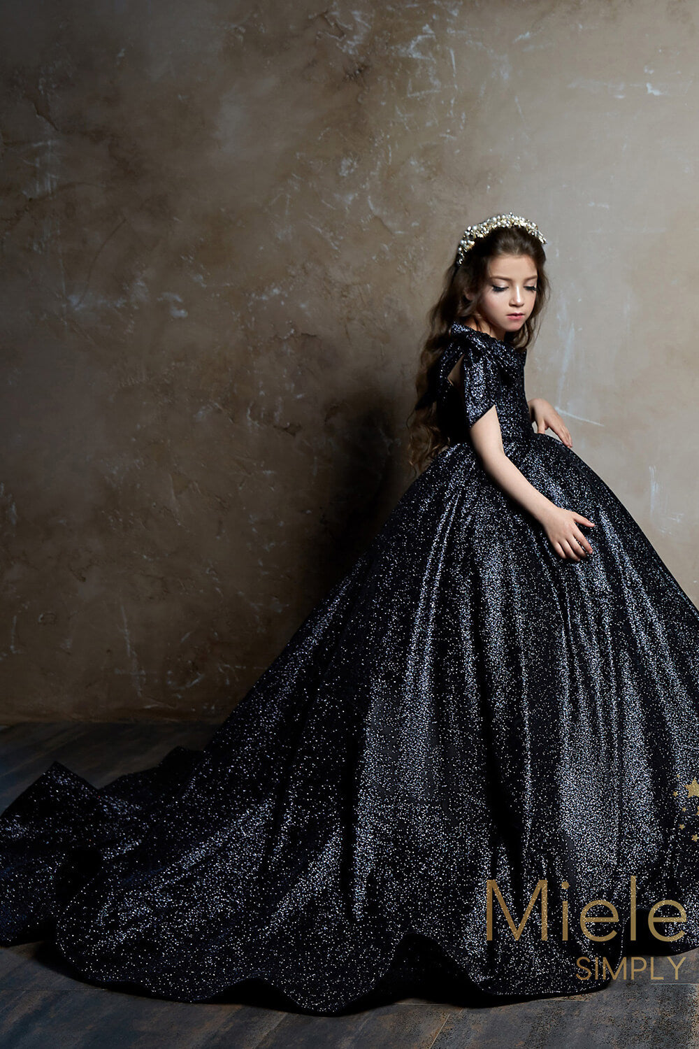 Pretty girl wearing Charlotte Flower Girl Couture Dress-by Miele Moda Boutique