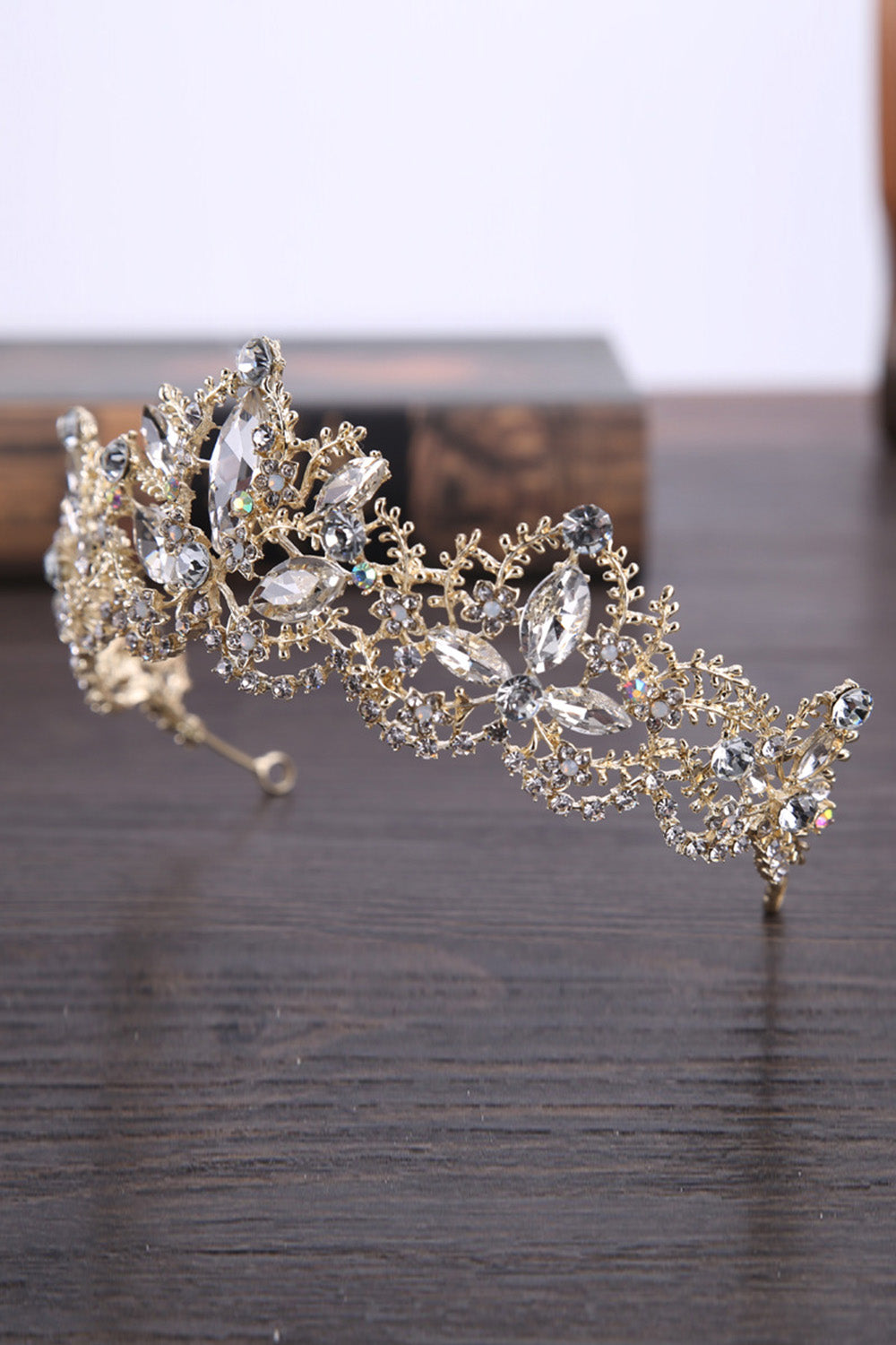 Pretty girl wearing Remi Rhinestones Gold Sparkly Metal Tiara-by Miele Moda Boutique