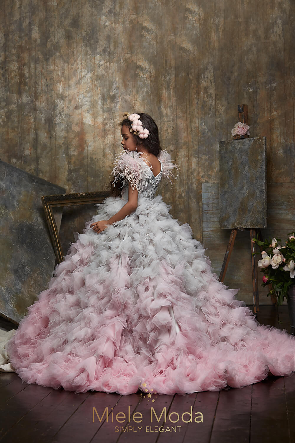 Pretty girl wearing Rosaline Flower Girl Couture Dress-by Miele Moda Boutique