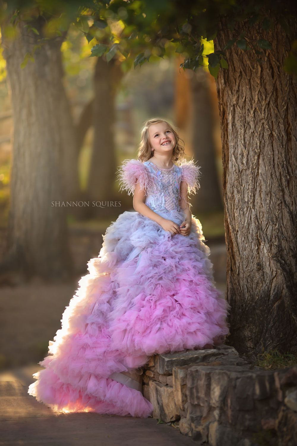 Pretty girl wearing Rosaline Flower Girl Couture Dress-by Miele Moda Boutique