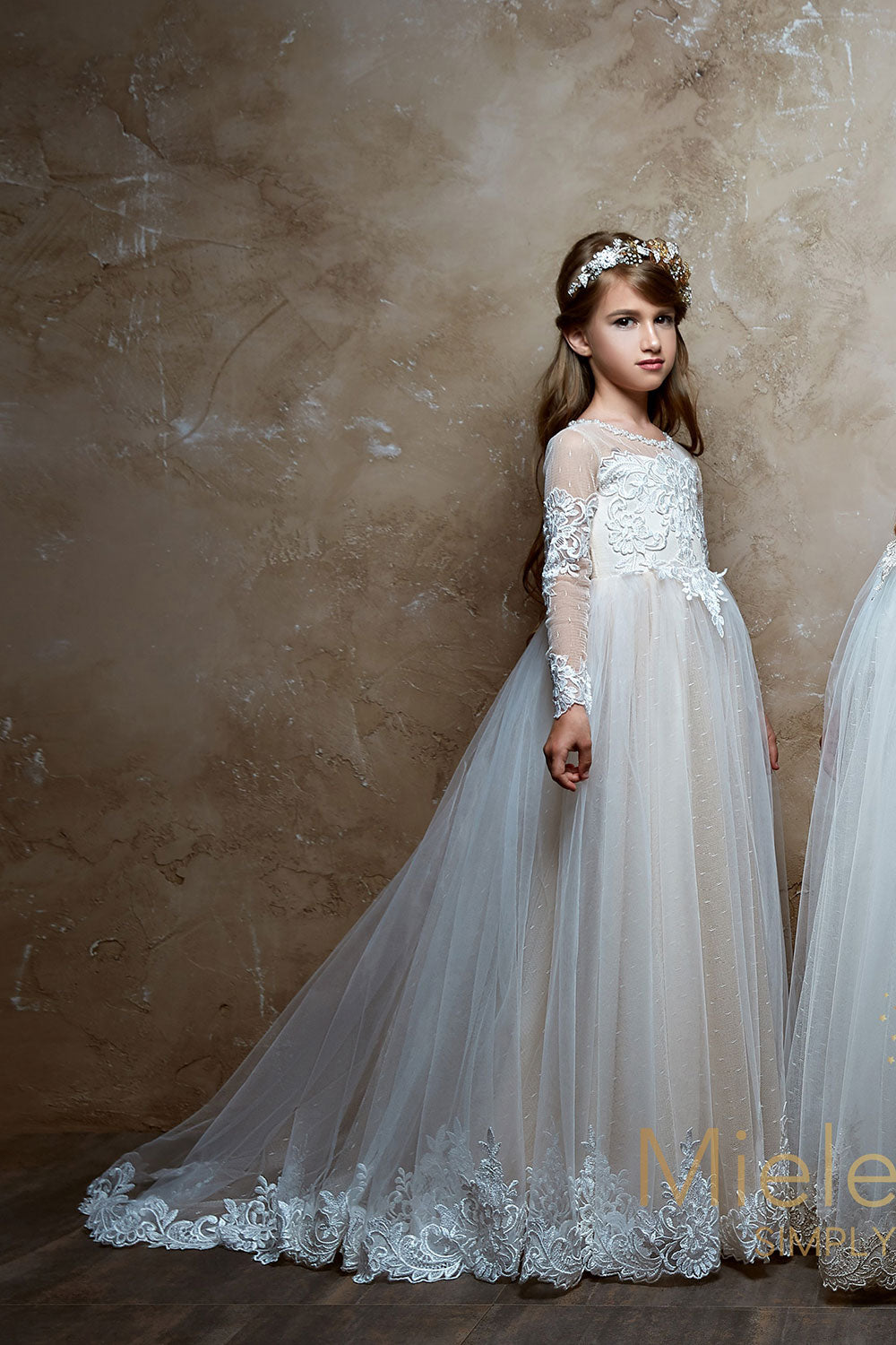 Pretty girl wearing Sienna Lace Flower Girl Dress-by Miele Moda Boutique