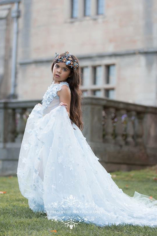 Pretty girl wearing Afina Butterflies Crystal Tiara-by Miele Moda Boutique