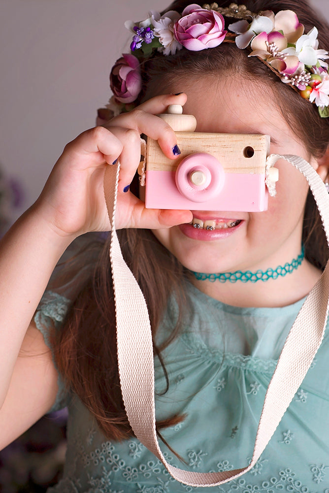 Pretty girl wearing Wooden Toy Camera For Toddlers Photo Prop-by Miele Moda Boutique