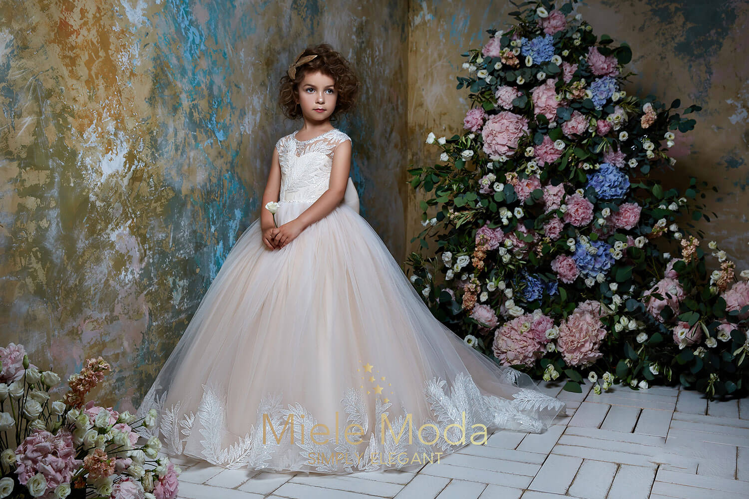 Pretty girl wearing Capri Flower Girl Couture Dress with Cape-by Miele Moda Boutique
