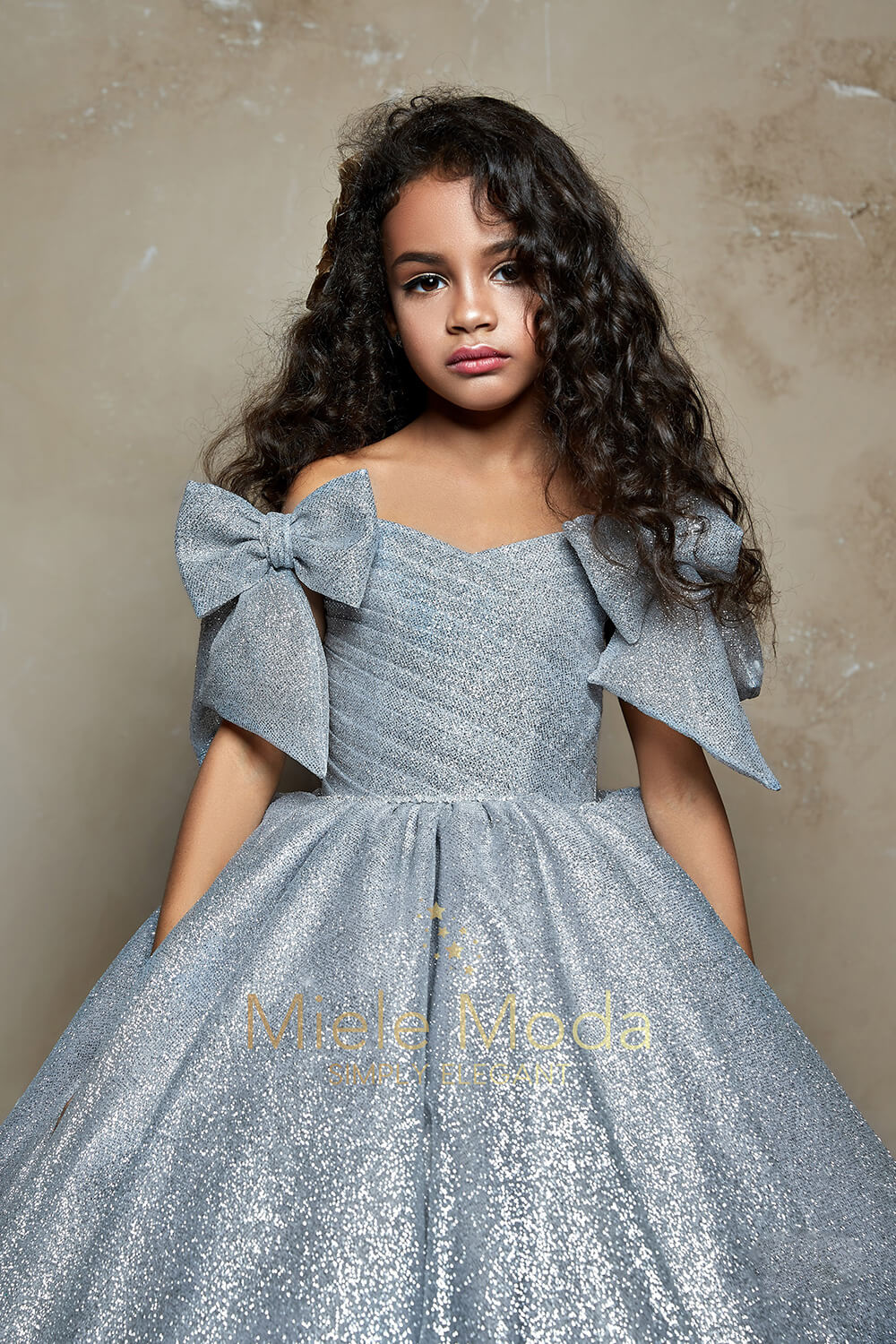 Pretty girl wearing Charlotte Flower Girl Couture Dress-by Miele Moda Boutique