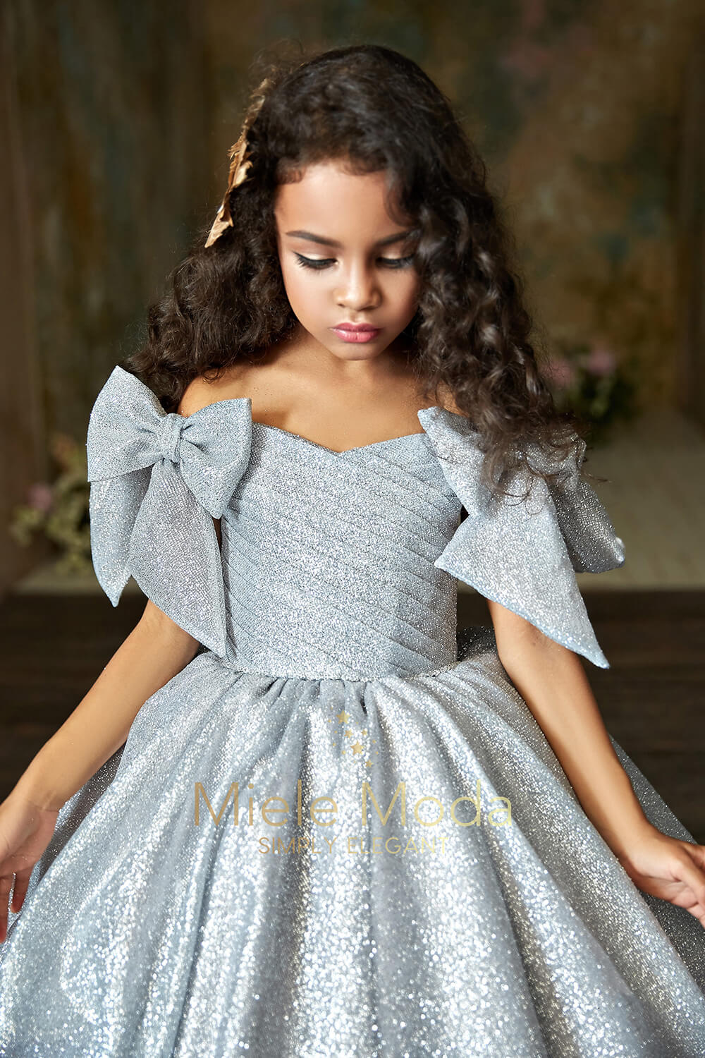 Pretty girl wearing Charlotte Flower Girl Couture Dress-by Miele Moda Boutique