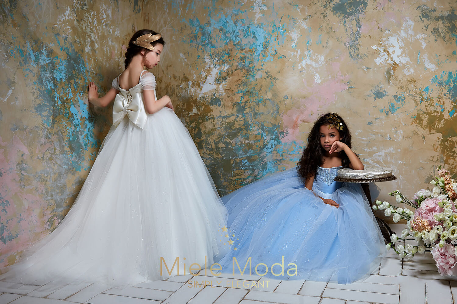 Pretty girl wearing Galina Flower Girl Couture Dress-by Miele Moda Boutique
