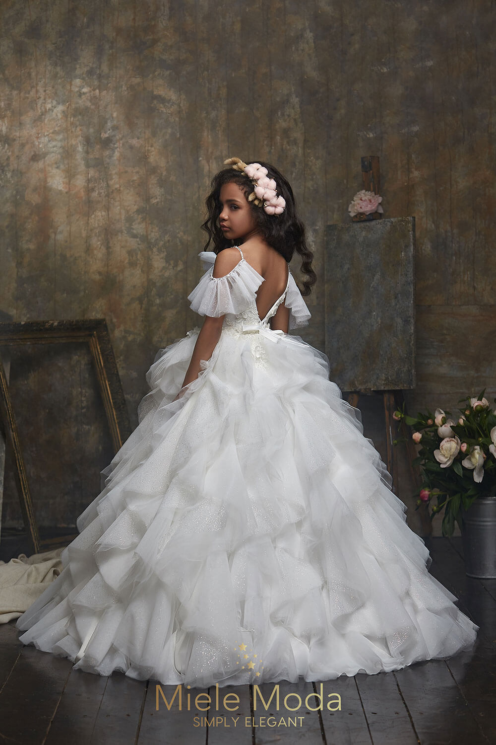 Pretty girl wearing Grace Flower Girl Couture Dress-by Miele Moda Boutique