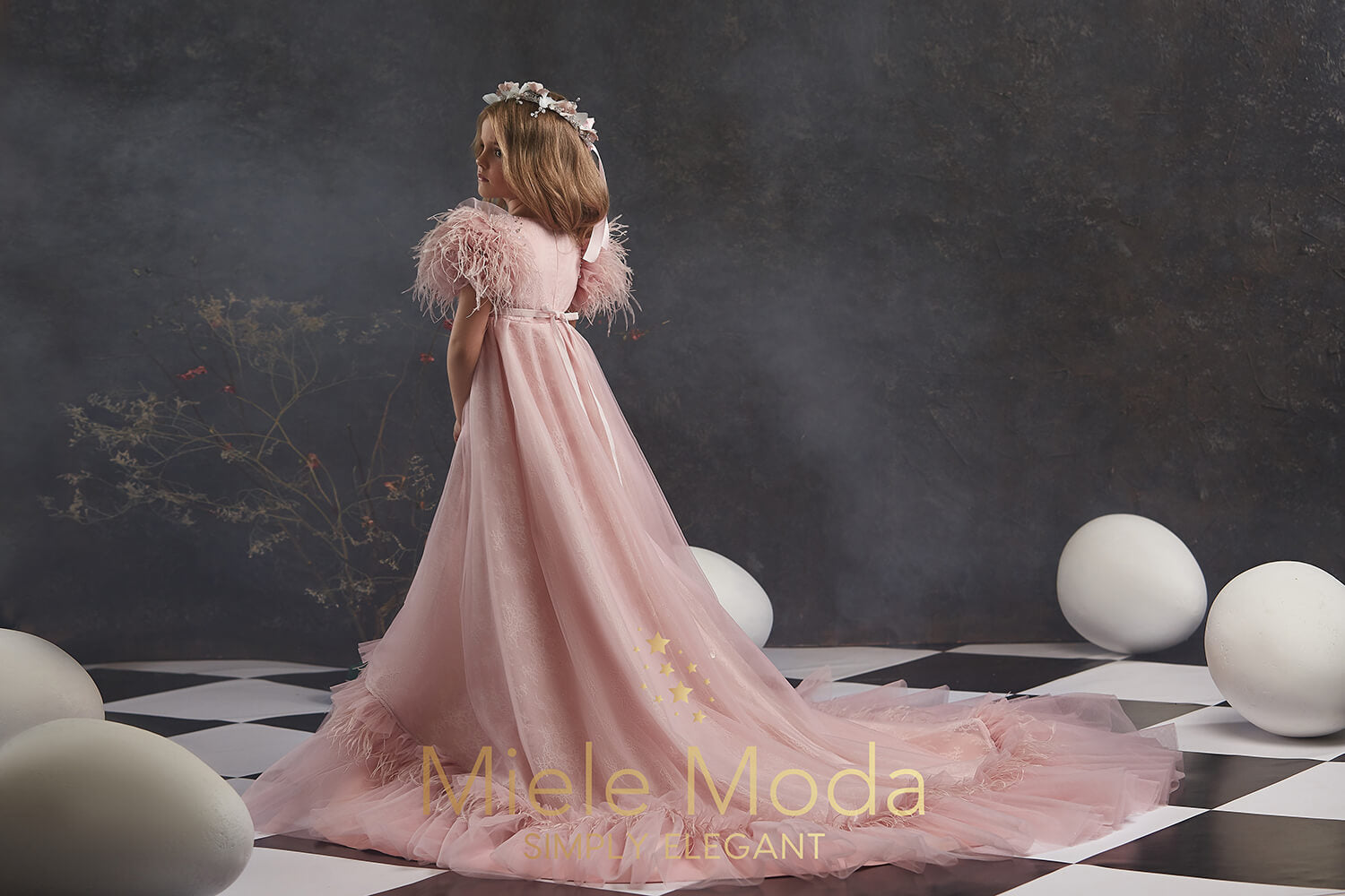 Pretty girl wearing Ophelia Flower Girl Couture Dress-by Miele Moda Boutique