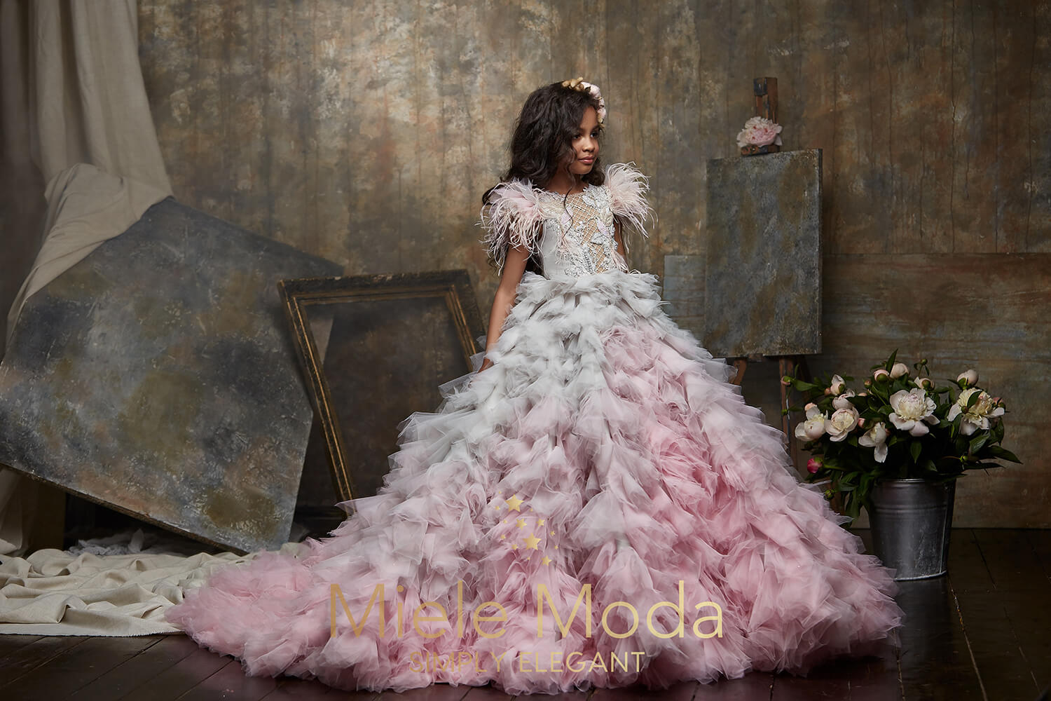 Pretty girl wearing Rosaline Flower Girl Couture Dress-by Miele Moda Boutique