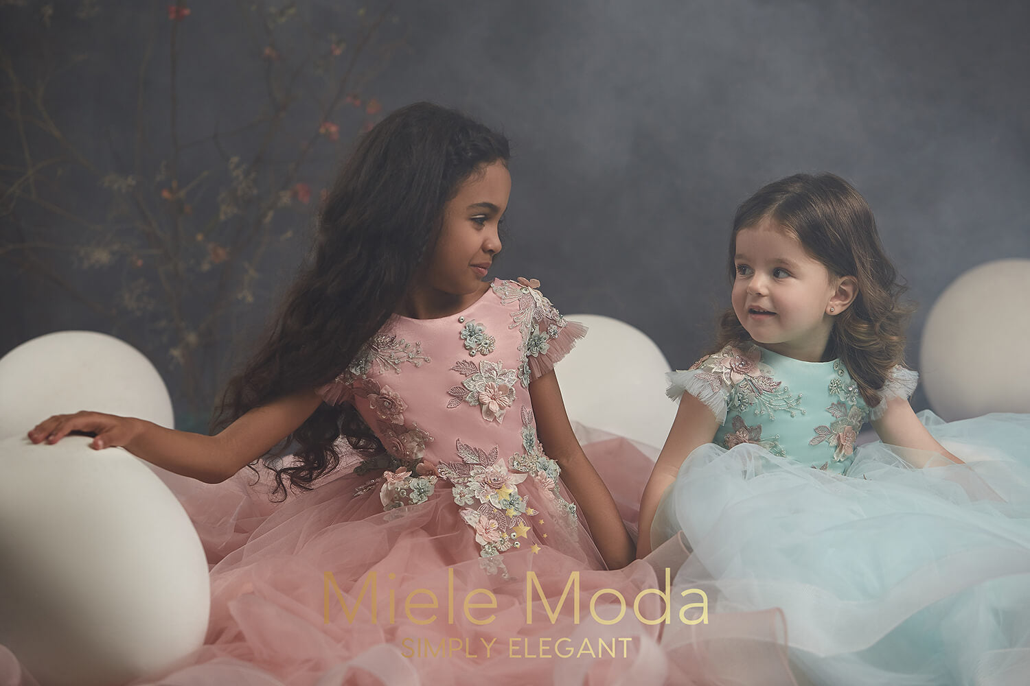 Pretty girl wearing Selina Flower Girl Couture Dress-by Miele Moda Boutique