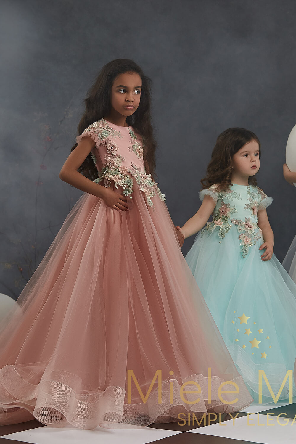 Pretty girl wearing Selina Flower Girl Couture Dress-by Miele Moda Boutique